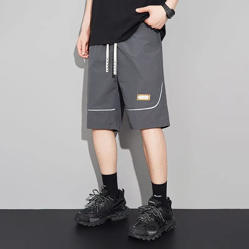 Men's casual handsome shorts, summer breathable five-point pants, ice silk loose pants, sports
