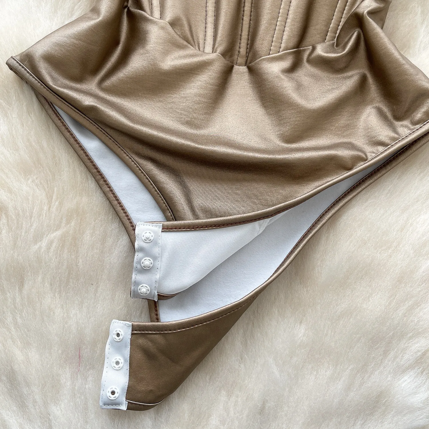 corset seam detail on fitted bodysuit