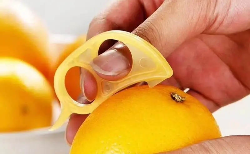 https://ae01.alicdn.com/kf/S094c25629ca44553b2998ea32c3440f5J/Orange-Peeler-Ring-Orange-Opener-Finger-Ring-Orange-Peeler-Lemon-Lime-Peeler-Remover-Double-Hole-Ring.jpg