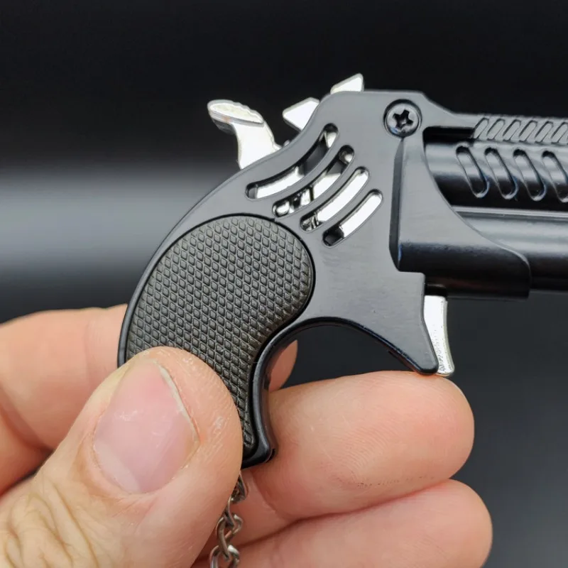 Mini Keychain Metal Rubber Band Gun Game Toy Gun Launcher Children's Simulation Pistol Toys Gifts Pendent 1Pcs