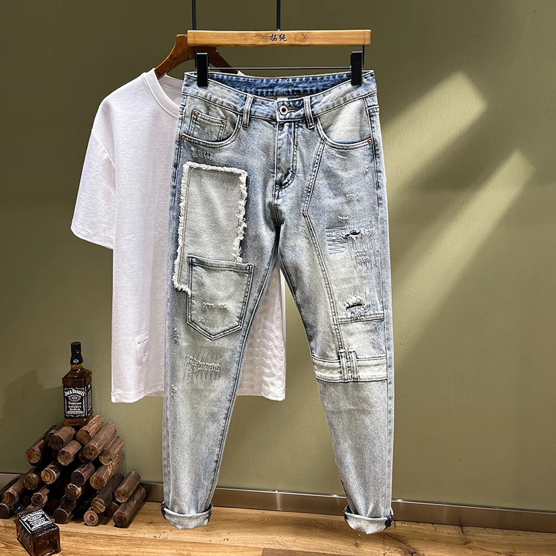 Retro street personality splicing men's jeans broken holes embroidery patches stretch Slim straight pants light blue summer new