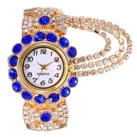 YIKAZE Luxury Women's Watches Gold Bangle Quartz Watch Hollow out Diamond Alloy Strap Ladies Bracelet Dress Wristwatch Clock 1