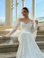 Flavinke فساتين زفاف بحورية البحر بيضاء لامعة مخصصة بأكمام طويلة على شكل قلب مزينة بالدانتيل فيستدو دي نوفيا 3