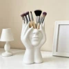 a1PCS Creative Human Body Art Styling Office Supplies Desktop Multifunctional Storage Pen Holder Makeup Brush Holder Decoration 1