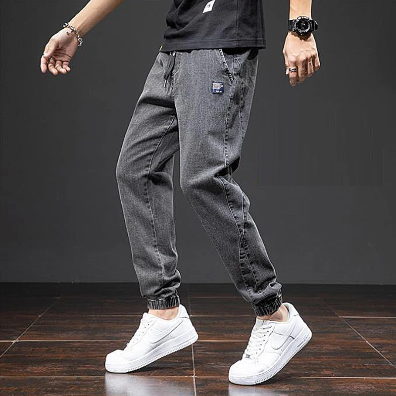 Large size elastic workwear men's ankle tied Harlan denim pants denim trousers cargo jeans wear-resistant and fat added plus size trendy and loose