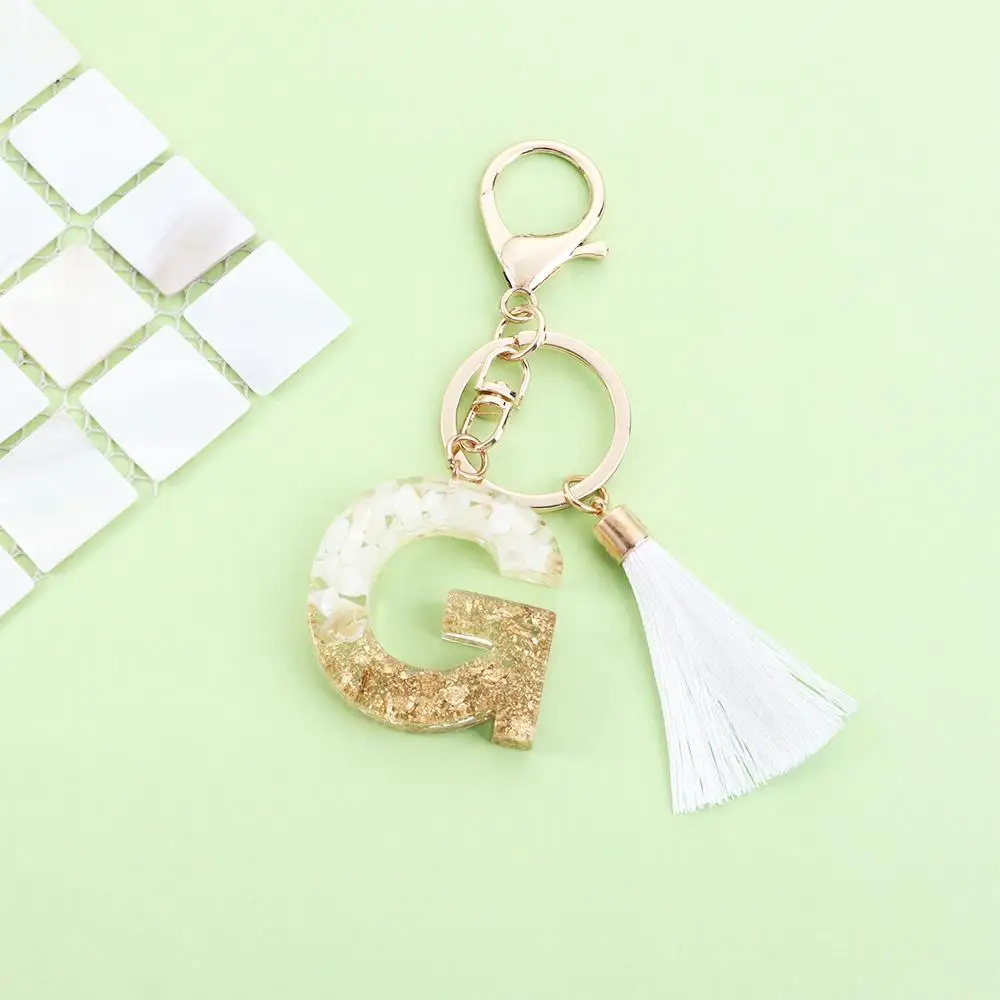 

Gold Foil White Tassel Pendant Ornaments Crystal English Alphabet Keyring Handbag Charms Alphabet Key Chain 26 Letter Keychain