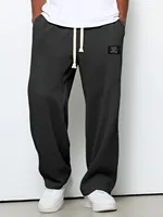 Pantalon de survêtement pour homme, tendance printemps-automne, coupe ample, extensible, jambe droite. Tissu gaufré. Pantalon décontracté sportif micro-extensible 2