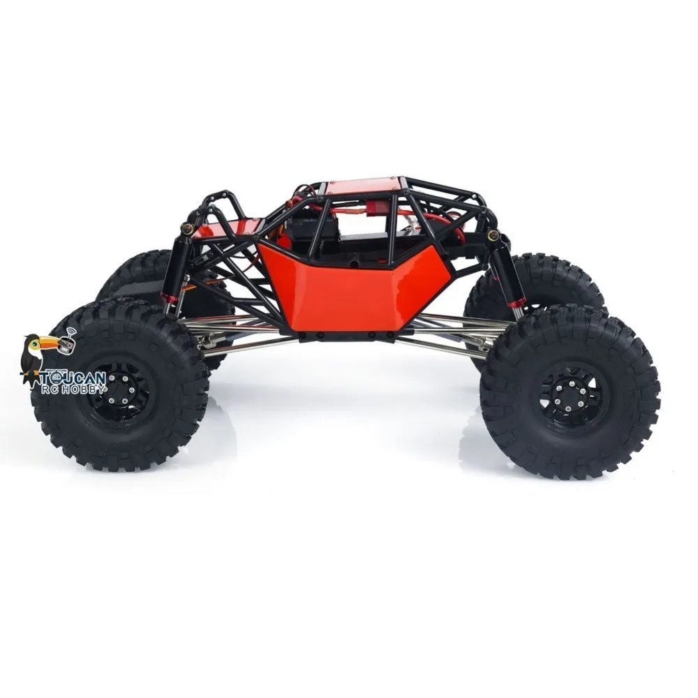 Vue de dessus de la voiture RC 1/10 4x4 tout-terrain rouge montrant ses pneus crantés, Cadeau Idéal pour Passionnés.