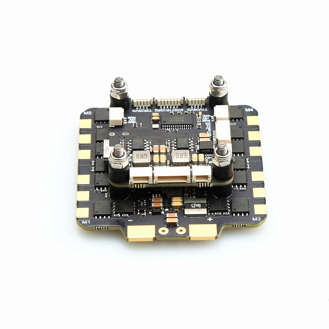 Combo contrôleur de vol F722 et ESC 90A pour drone FPV freestyle, posé sur une surface antistatique.
