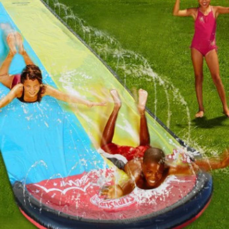Children Play with Water Toys and Water Skiing Watercourses in Summer Children Play with Water in the Lawn Courtyard in Pairs 2
