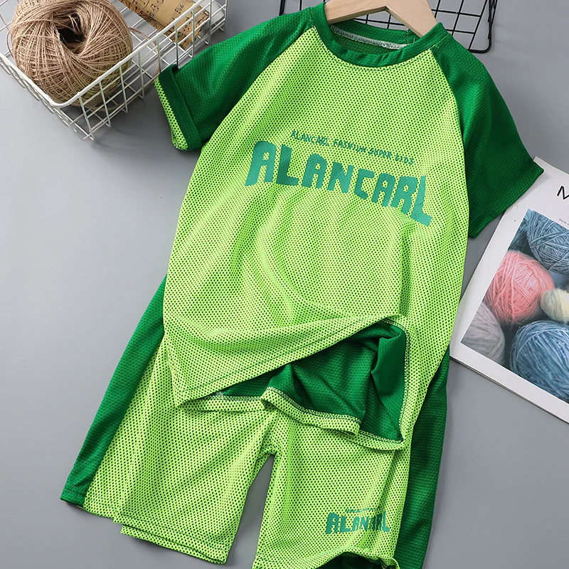 

Children's new letter printing summer boy color matching short-sleeved shorts sports suit two-piece suit 4-10 years old.