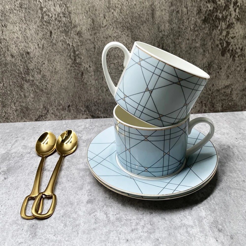 https://ae01.alicdn.com/kf/S09df3dfe3c7d4688bffa427add0df168B/Porcelain-Coffee-Cup-And-Saucer-Bone-China-Coffee-Set-Mark-Nordic-Design-Outline-In-Gold-Tea.jpg