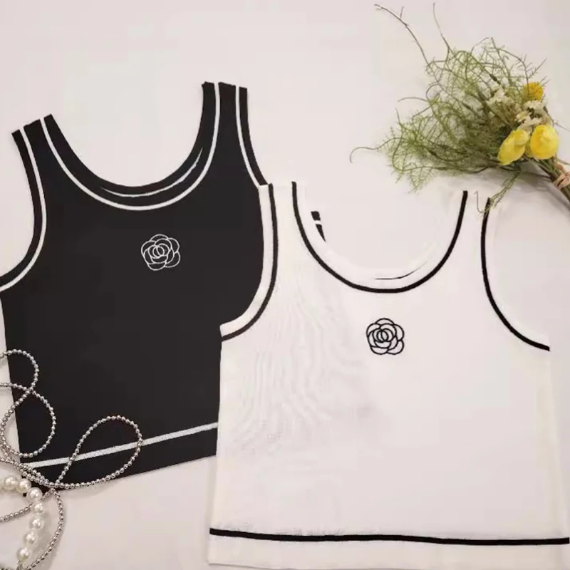 

Летняя сексуальная тонкая слинг Спайс девушка милая жилетка Повседневный популярный топ без рукавов для пляжного отпуска белая ледяная шелковая фотография