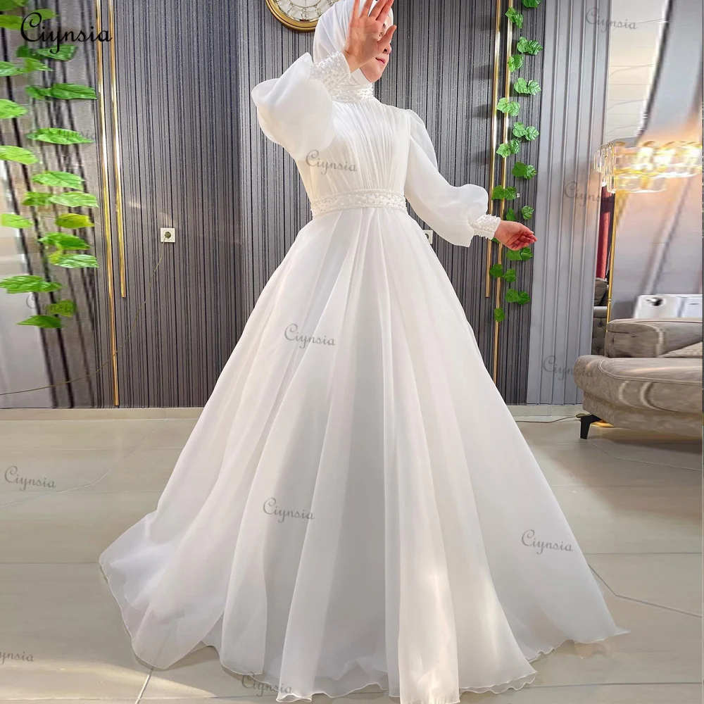 

Ciynsia A-Line Hijab Muslim Wedding Gown 2024 Vestido De Noiva Long Sleeves High Neck Pearls Organza Dubai Arabic Bride Dress
