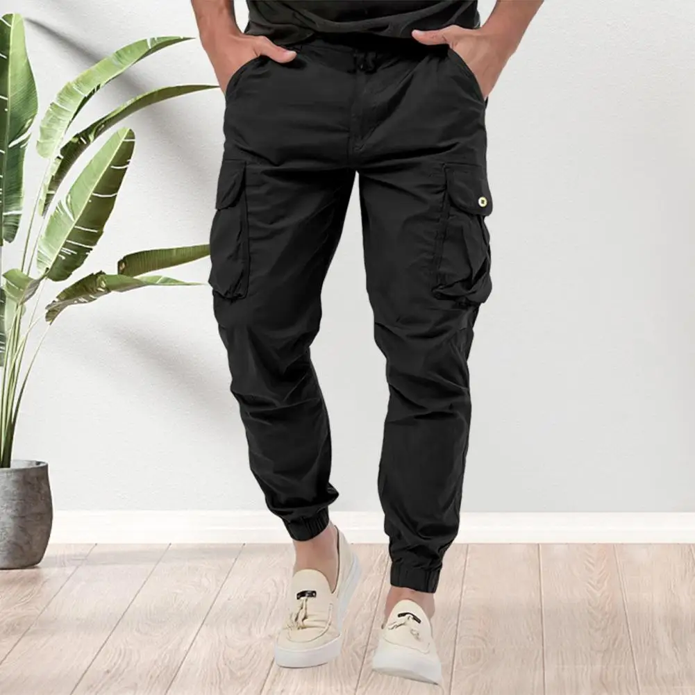 

Men Pants Mid Waist Multi Pockets Button Zipper Closure Cargo Pants Solid Color Loose Ankle-banded Long Trousers For Dating