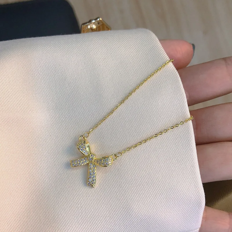 2025 Women Fashion Fashionable acrylic necklace, silver beads and bow shaped crystals, women's evening jewelry_voghion.com