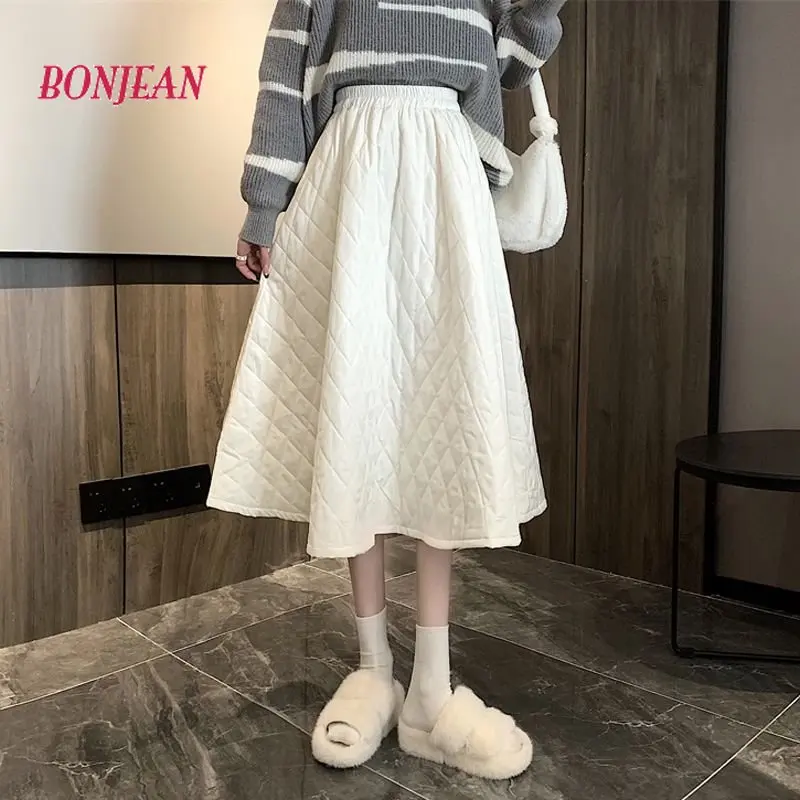 

2023 Autumn/Winter New Design Feeling Diamond Checker Cotton Clip Skirt Elastic High Waist Thickened Mid length Skirt Children