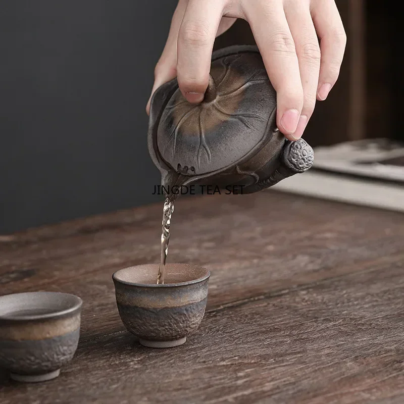 Rough pottery lotus leaf hand-held pot Chinese retro old rock mud gold-plated iron glaze Kung Fu tea set lid bowl