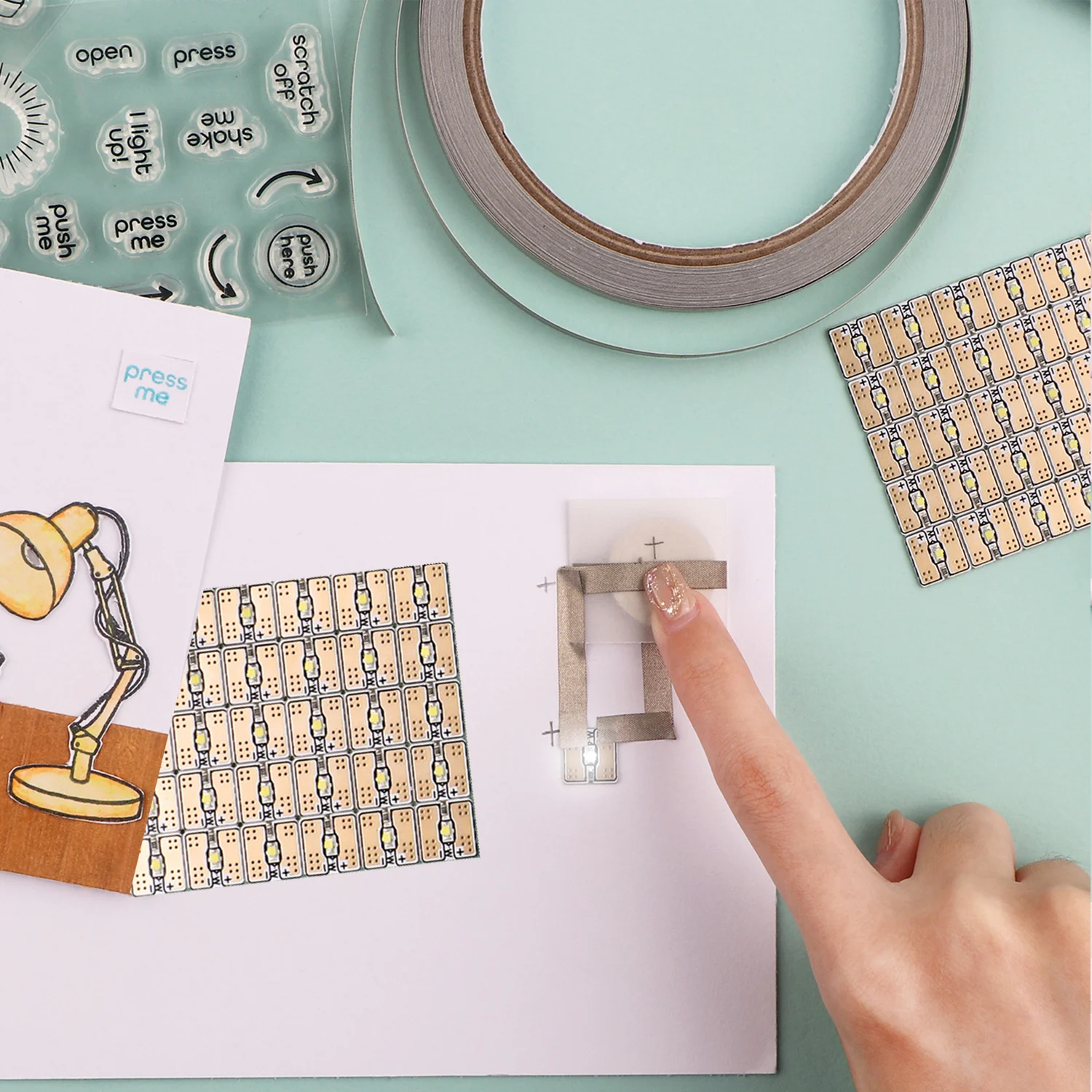 

Animating White LED Circuit Stickers and Conductive Fabric Tape Light Craft Kits To Make Light Elements On Crafting Projects