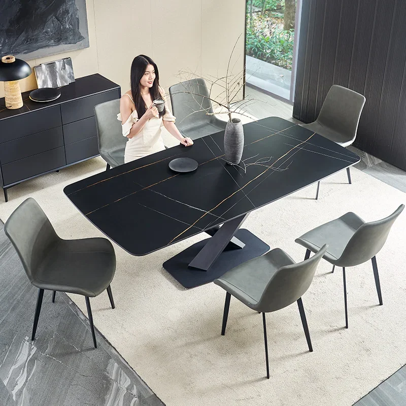 

The rocky table is minimalist, light and extravagant, online celebrities, high-end modern simple Italian dining table.