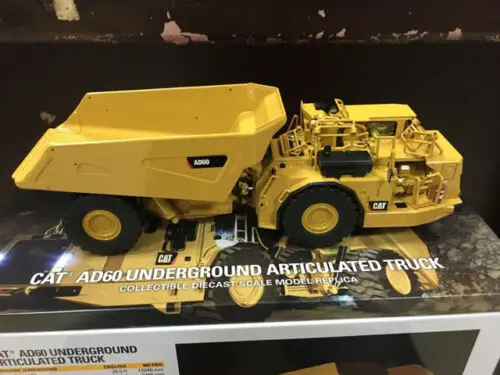 Miniatura Caminhão Articulado Subterrâneo Caterpillar Modelo AD60 Escala  1:50 - 85516 - Super Tek