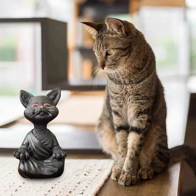 Sculpture de chat en position assise en pierre de taille