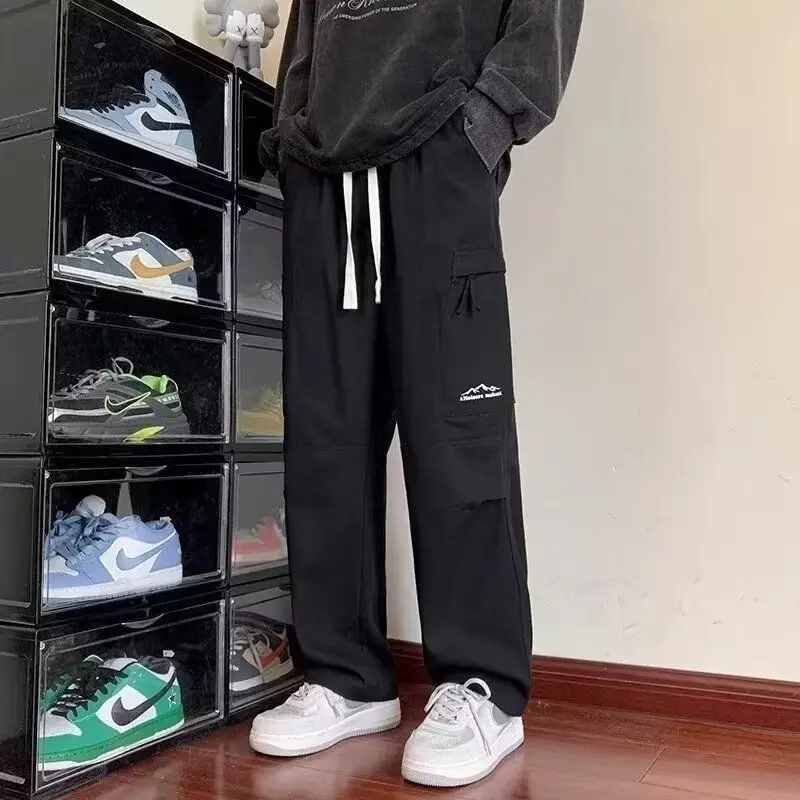 Abbigliamento da uomo autunno inverno coulisse tinta unita tasche elastiche a vita alta Casual pantaloni larghi comodi Boyfriend coreani 2