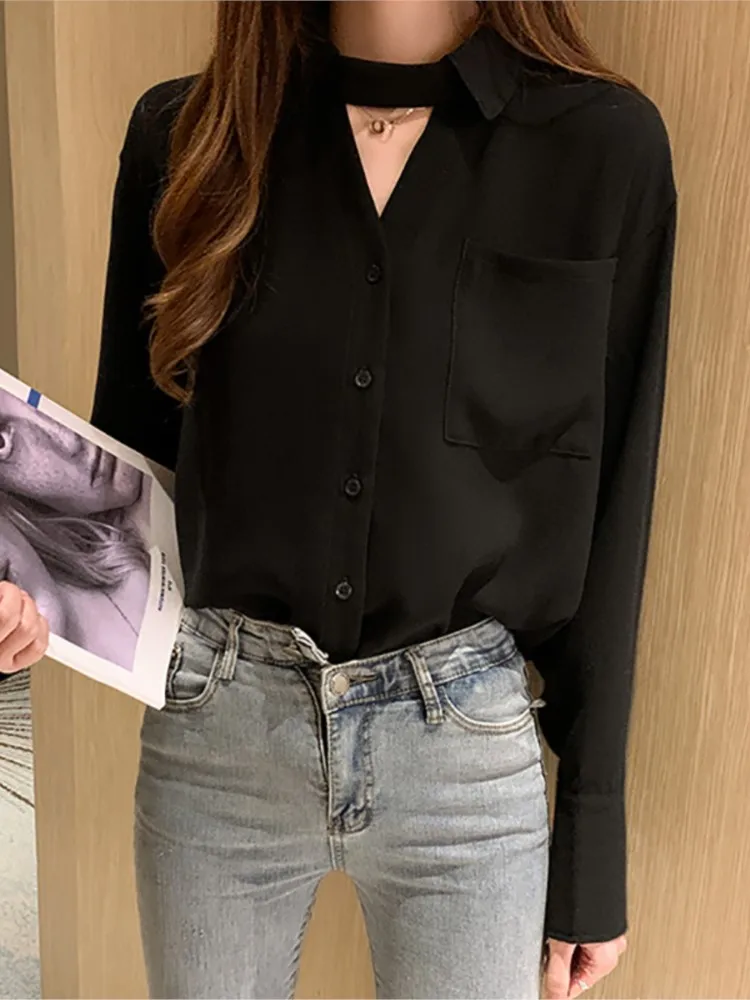 blusa negra botones mujer