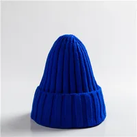 Knitted  Solid Edge Curl Colored Woolen Men's and Women's  Ear Protection Warm Fitting Hood  Autumn and Winter Hat Trend - Image 4