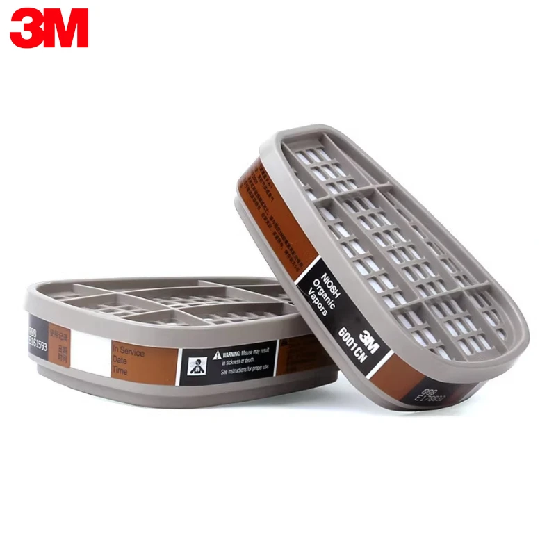 Paire de cartouches filtrantes 3M 6001 avec emballage d'origine et logo NIOSH visible.