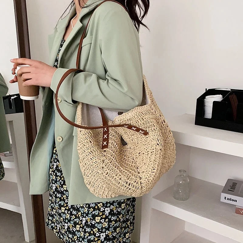

2023 Spring/Summer New Hollow Out Single Woven Bag Fashion One Shoulder Grass Woven Bag Paper Rope Leisure Women's Bag Beach Bag