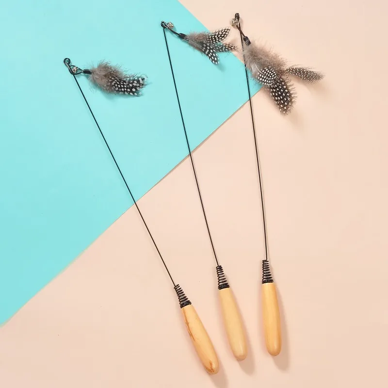 Spring Teasing Cat Stick Wooden Handle Cat Teaser Stick Toy Feather Funny Simulation Fishing Rod Bell Squeaky Toy