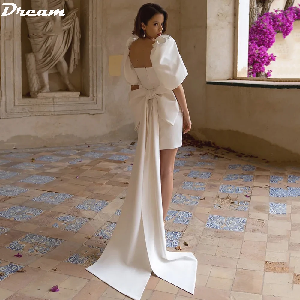 DREAM 우아한 새틴 짧은 미니 인어 웨딩 드레스, 빅 보우 하프 퍼프 슬리브, 무릎 길이 위, 시크 백리스 신부 가운 