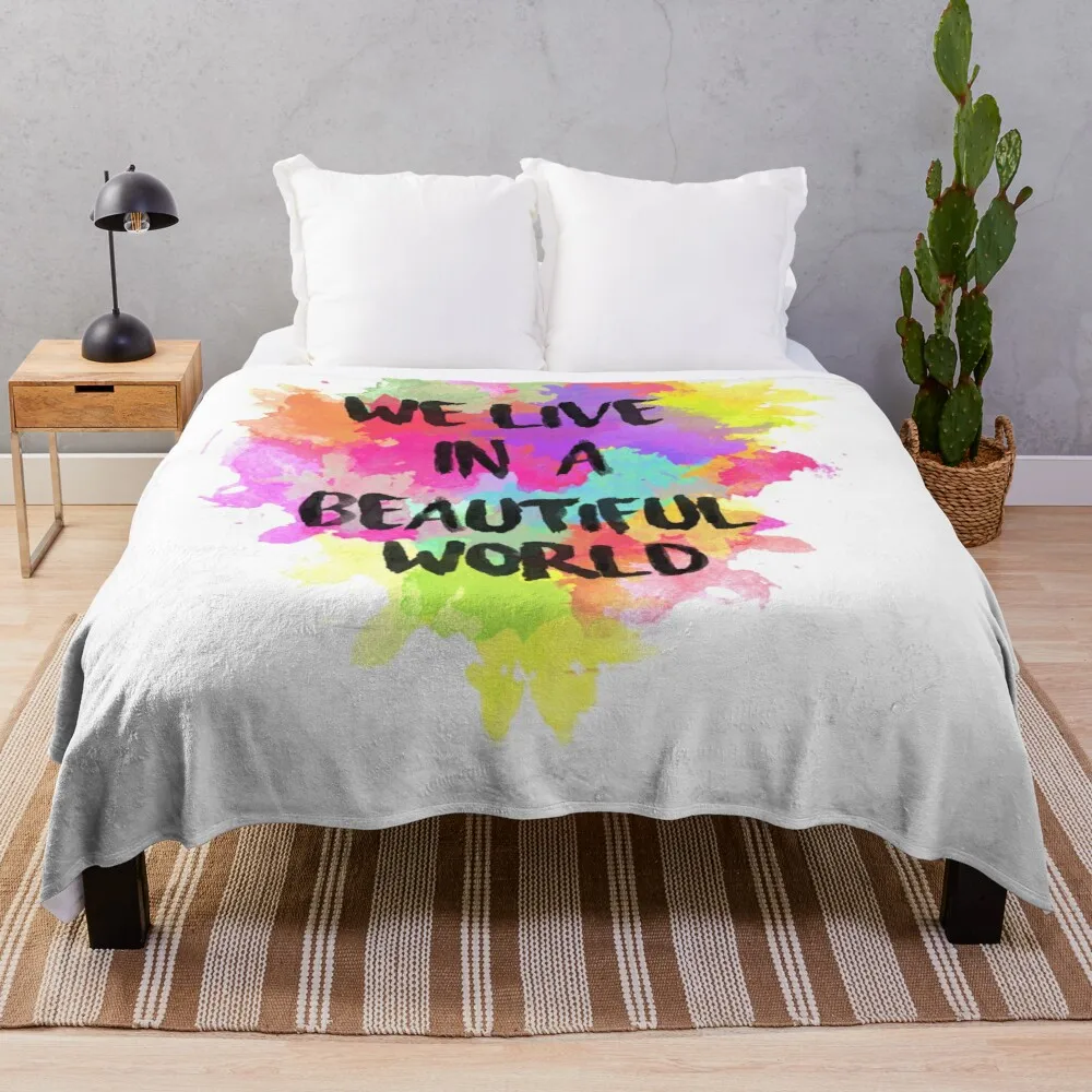 

We Live in a Beautiful World Watercolor Throw Blanket Beautiful Blankets