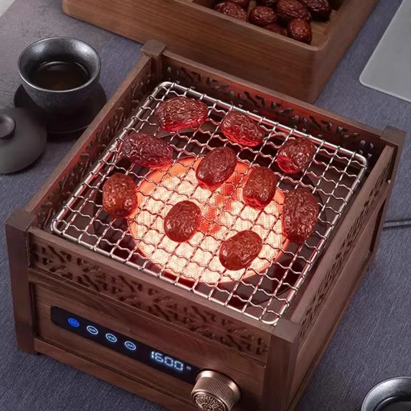 Making tea around the stove walnut wood electric ceramic stove tea boiler boiling water boiling teapot