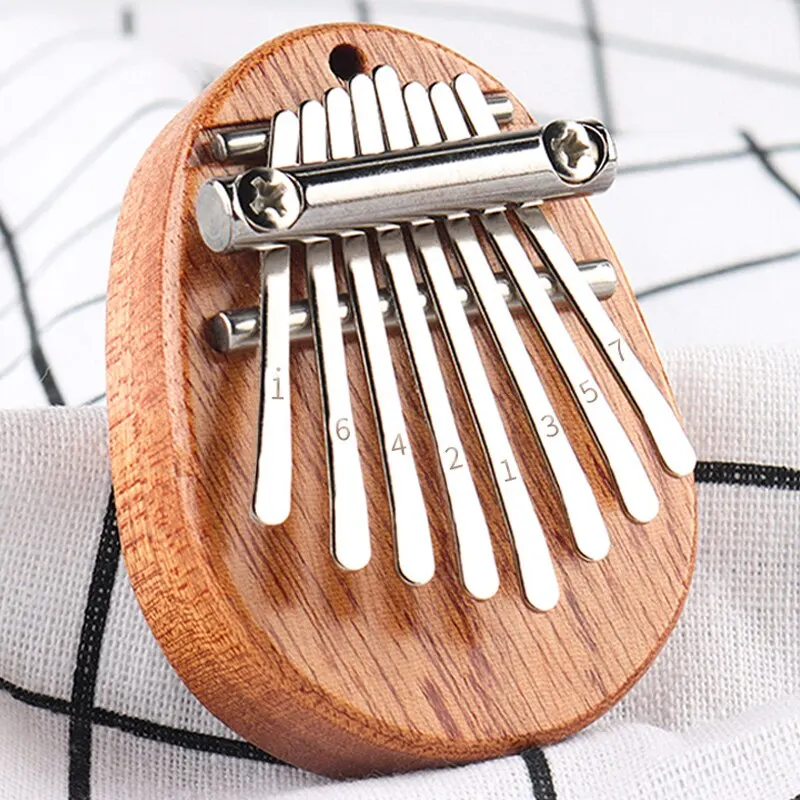 1Pcs Wood Mini Thumb Piano Musical Toys 8 Tones Portable Beginner Finger Piano 2