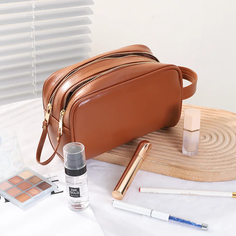 2023 New Unisex Makeup Bag Fashion High Quality Leather Travel Storage Bag Solid Color Versatile Large Capacity Portable Handbag