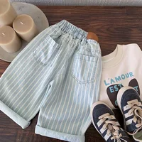 Pantalons pour enfants printemps 2026 nouveaux pantalons décontractés à rayures élégants polyvalents à la mode vêtements de tempérament quotidien 4