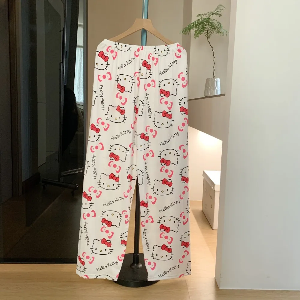 A pair of loose-fitting Hello Kitty pajama pants with a charming cartoon print gray