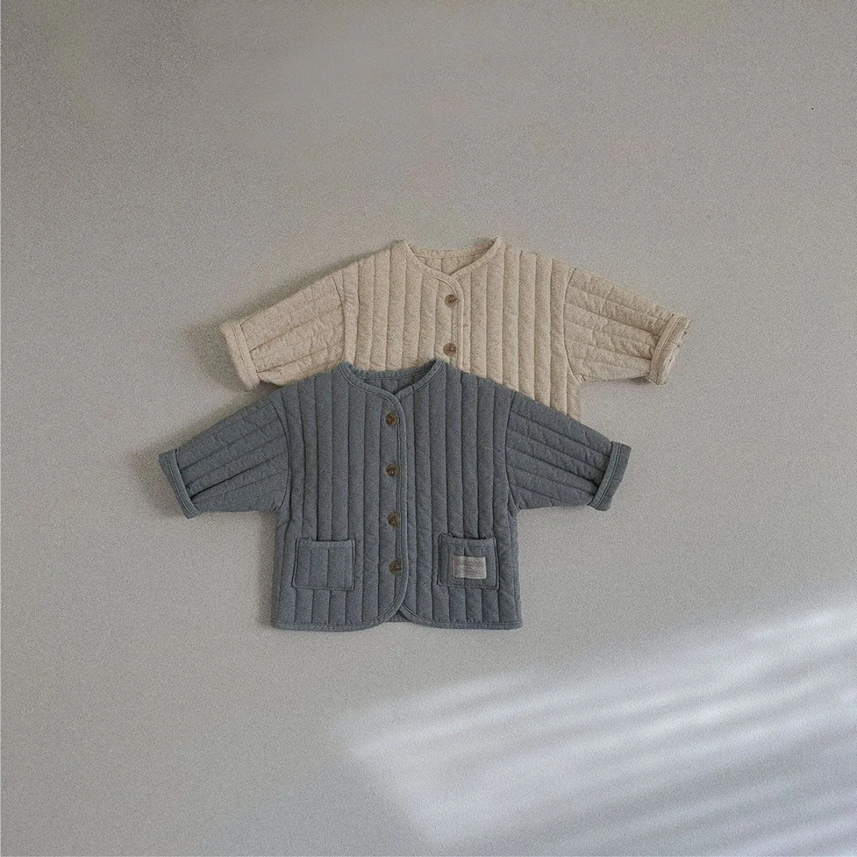 Description Picture 3 of item2025 Winter New Baby Long Sleeve Warm Coat Solid Infant Girls Plus Velvet Thick Cardigan Coat Toddler Boys Cotton Padded Jacket