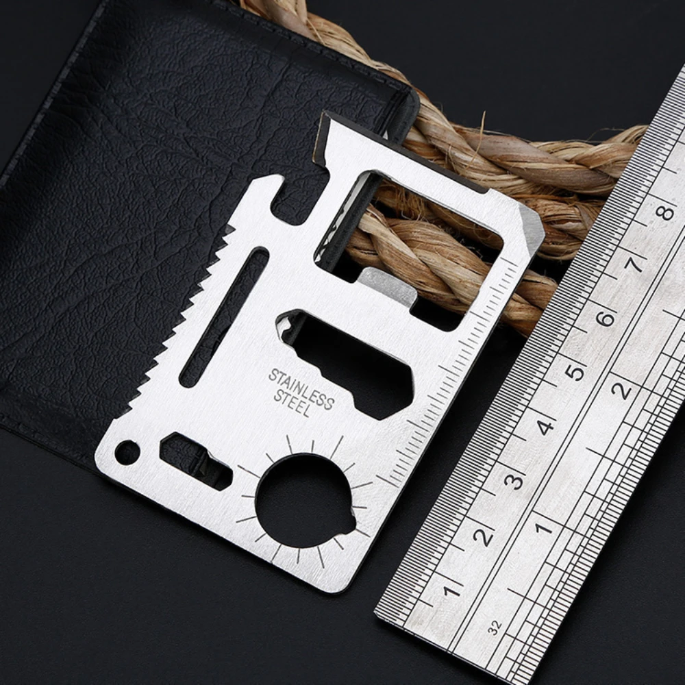 Stainless steel credit card-sized multitool shown from the front