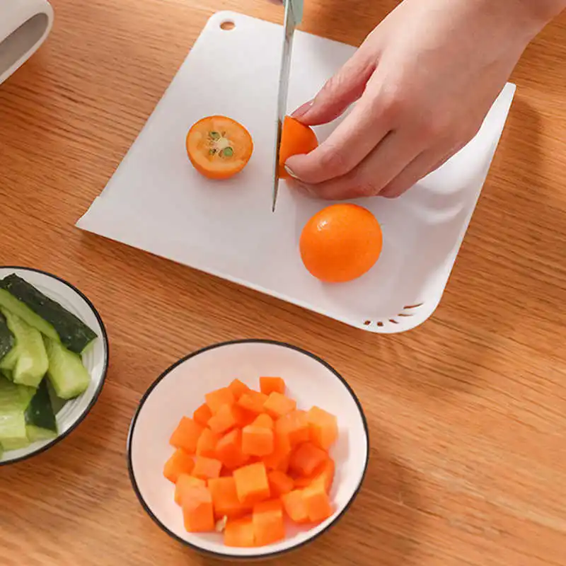 https://ae01.alicdn.com/kf/S0ad6ad46e7fd4072bff44348147f1936C/Small-Chopping-Block-Eco-friendly-Plastic-Cutting-Board-with-Filter-Porous-Drain-Cut-Fruit-Vegetables-Boards.jpg