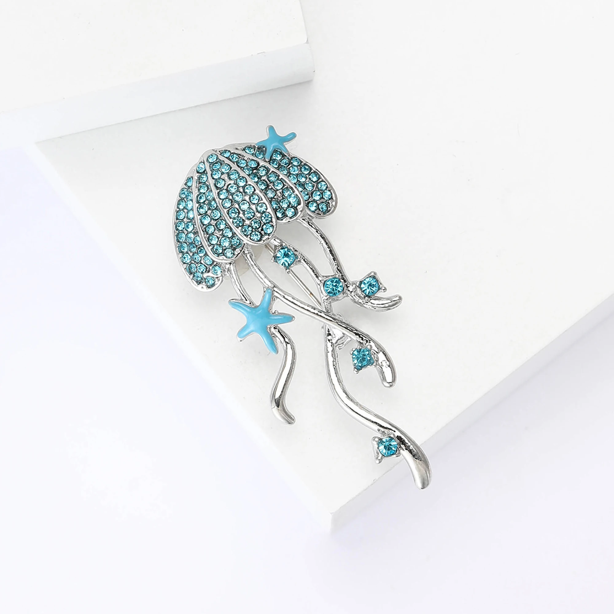 دبابيس جميلة على شكل قنديل البحر من حجر الراين للن...