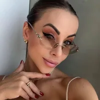 Nouveau y2k Vintage sans monture ovale lunettes de soleil femmes pour hommes marque de luxe concepteur lunettes de soleil Punk populaire boule de métal Sexy lunettes 3