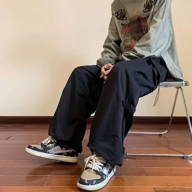 2025 nouvelle salopette pour hommes multi-poches pantalon hip hop américain hommes Ins High Street printemps et automne pantalon d'assaut de pied groupé 3