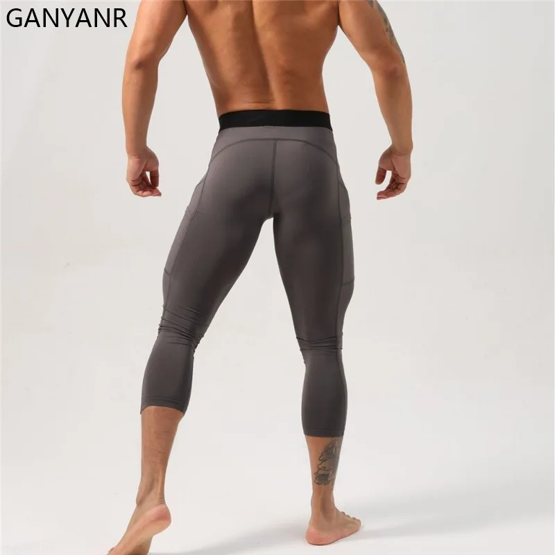 GANYANR Running Tights Men With Pockets Compression Leggings Gym Fitness Football basketball Soccer Sportswear Pants trousers