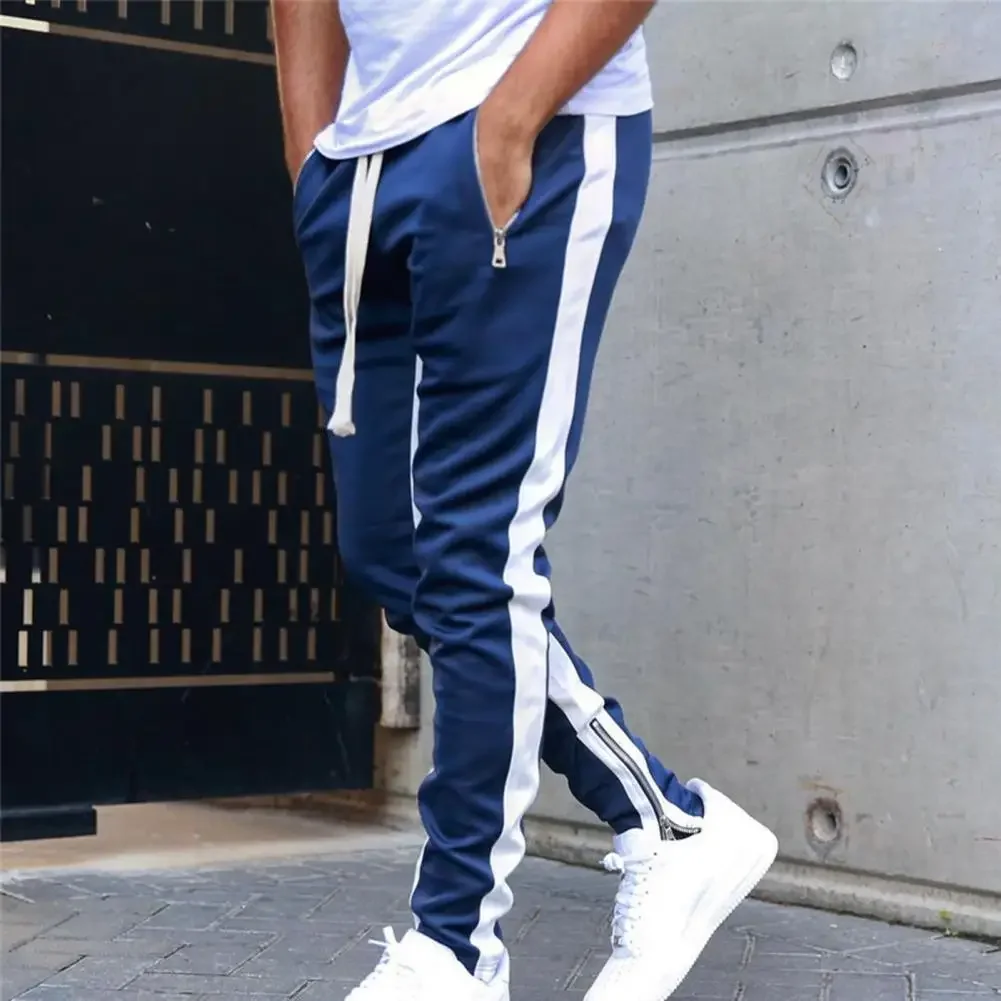 

Mens Sports Joggers Casual Stitching Pants Fitness Men Sportswear Tracksuit Bottoms Skinny Sweatpants Gyms Track Pants