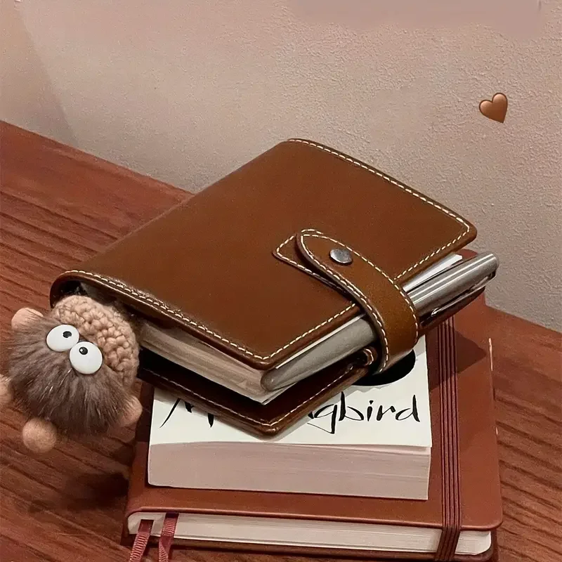 دفتر ملاحظات A7 محمول بجلد صناعي أنيق – رفيقك اليومي للكتابة والرسم