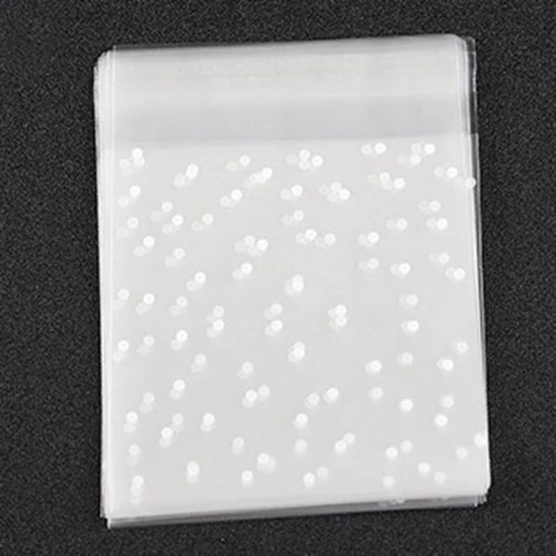 100pc Zellophan selbst klebende Tasche Punkte Plastiktüten gegenüber versiegelten Schmuck Geschenke Süßigkeiten Kleidung Kuchen Verpackung transparente Beutel