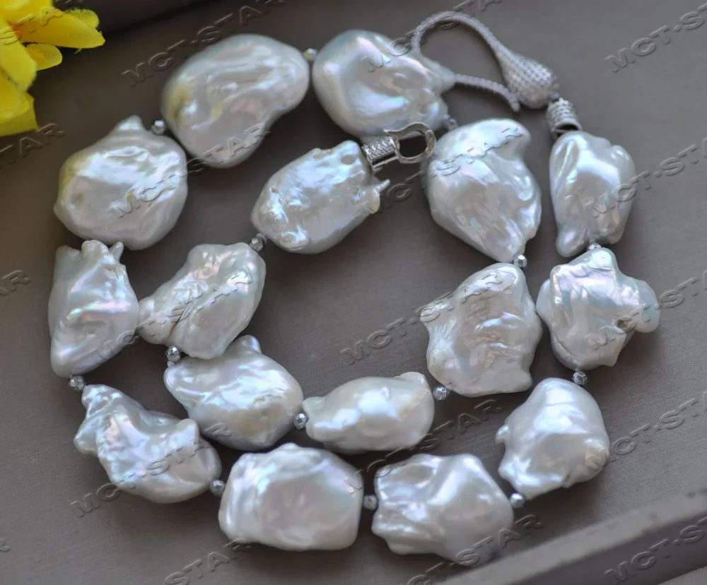 

Z12528 19" 27MM WHITE BAROQUE KESHI PEARL NECKLACE CZ